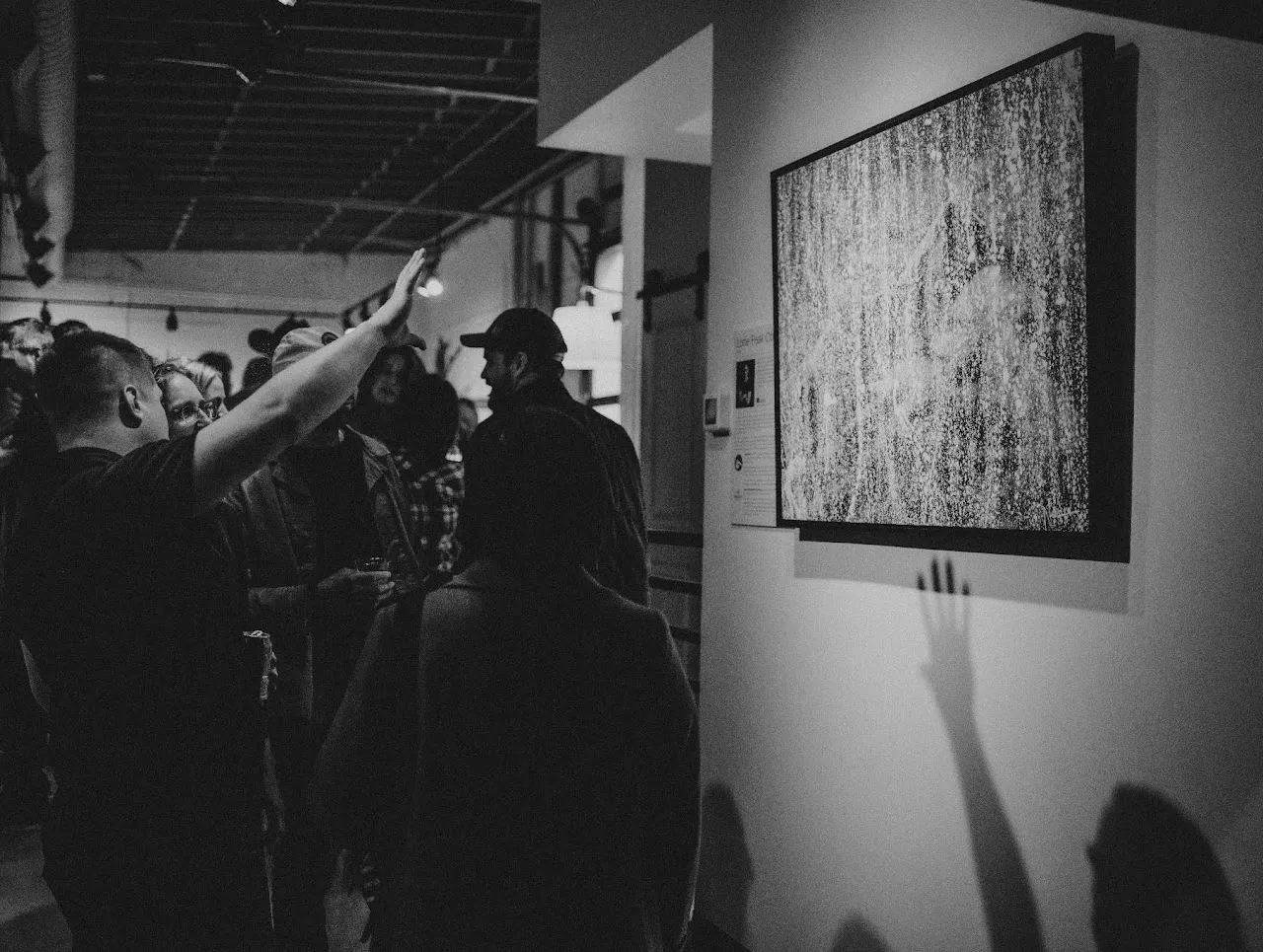 Crowds at a Northside gallery opening.
